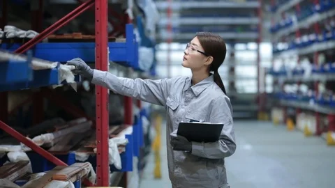 Chinese engineer inspecting in factory,HD Stock Footage 117908707