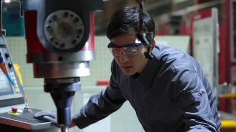 Chinese engineer working in factory,HD Stock Footage 117901487