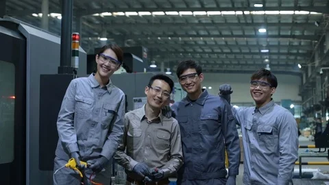 Chinese engineers operating in factory,HD Stock Footage 117898520