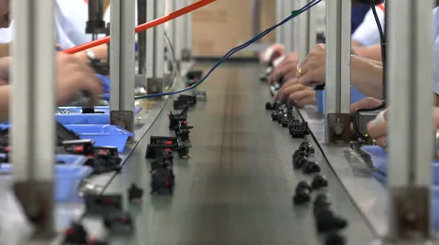 Chinese factory, conveyor belt, hands, monotonous, manual labor, industrial Stock Footage
