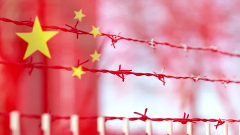 Chinese flag and barbed wire as a symbol of dictatorship and oppression Vídeo Stock 295582220