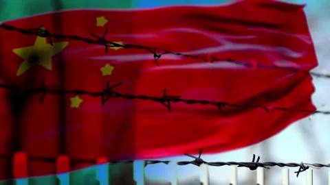 Chinese flag and barbed wire as a symbol of dictatorship and oppression Stock Footage 295582230