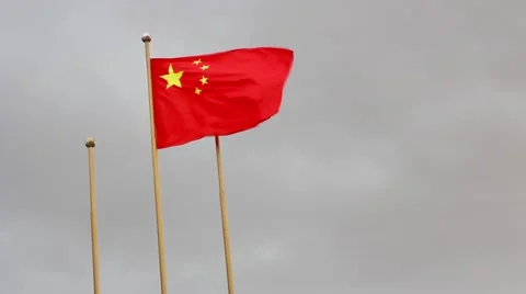 Chinese flag flying  during bleak weather Stock Footage 47909241