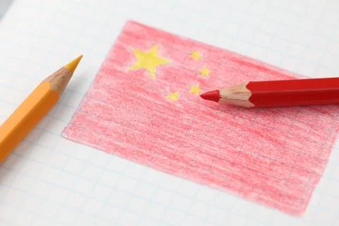 Chinese flag in pencil inside notebook Stock Photos