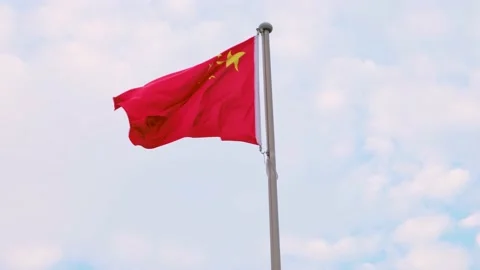 Chinese flag waving in the wind in the sky Stock Footage 157763257