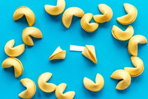 Chinese fortune cookies pattern flat lay. Chinese New Year concept Stock Photos