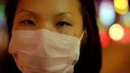 Chinese Girl Cover Her Face With Mask At Night Stock Footage