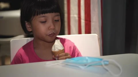 Little Girl Licking Ice Cream Stock Video Footage | Royalty Free Little ...