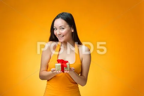 Chinese girl with a gift Stock Photos