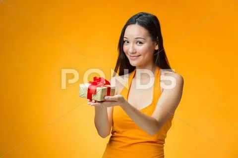 Chinese girl with a gift Stock Photos