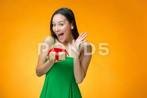Chinese girl with a gift Stock Photos