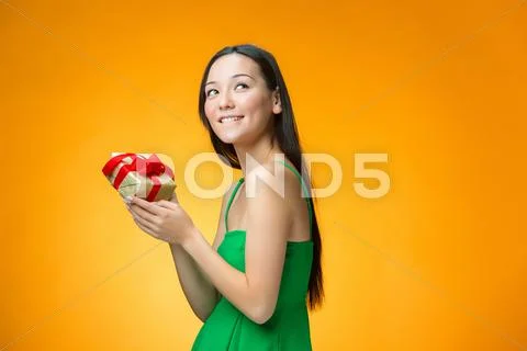 Chinese girl with a gift Stock Photos