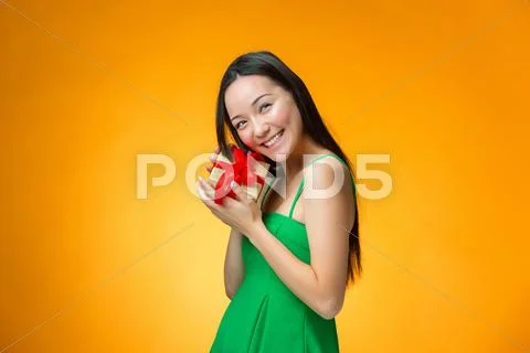 Chinese girl with a gift Stock Photos