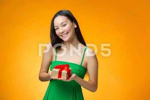 Chinese girl with a gift Stock Photos