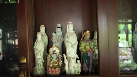 Chinese Goddess statues stack rack in room antiques classics of old asian style Stock Footage 198108737