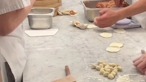 Chinese Hand-Made Fresh Dumplings - Close up rolling dumplings and pastry dough 動画素材 251991553