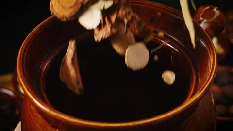 Chinese Herbal Decoction Pot Placed on Stove for Video stock 339319487