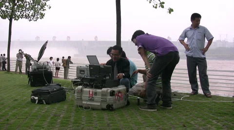 Chinese journalists before Three Gorges Dam Stock Footage