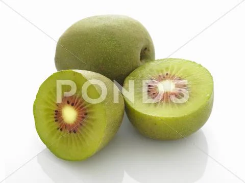 Chinese kiwis, whole and halved Stock Photos