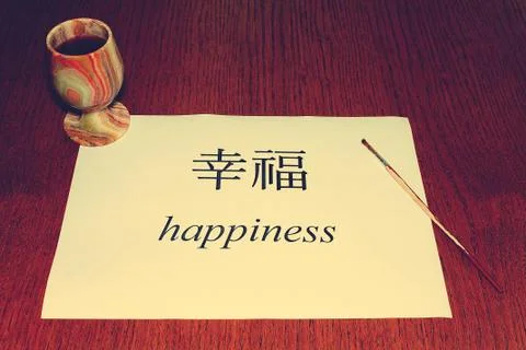 Chinese Language Day. On the table is a white sheet of paper on which the wor Foto stock