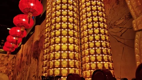 Chinese Lanterns and Buddhist Prayer Wheels in Lights Inside Temple, Shanghai Stock Footage 333229769