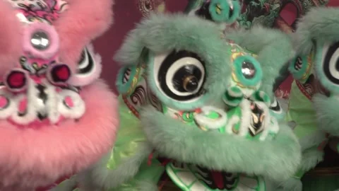 Chinese lion dance performing during the Lunar New Year festival. Video stock 328214610