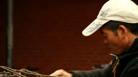 Chinese Man Working On A Lantern Video stock 10594294