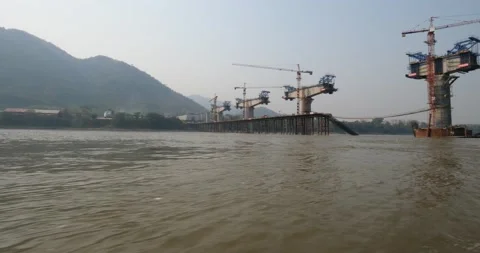 Chinese mega train bridge project on the Mekong River, Loas Stock Footage 135498376