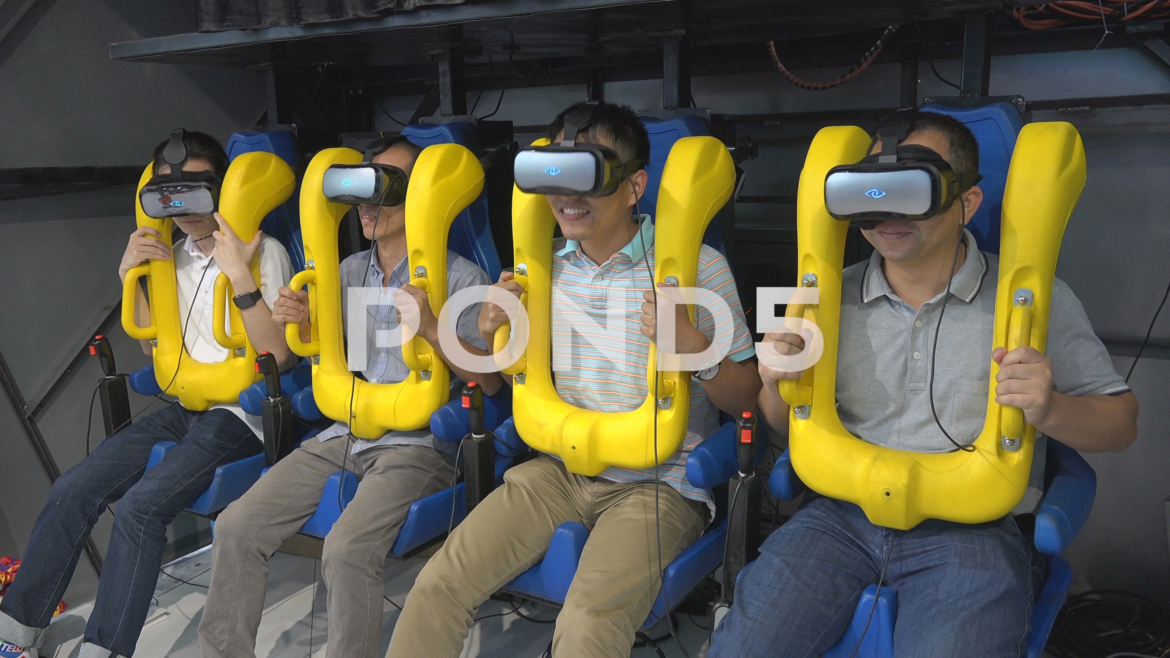Chinese men wear virtual reality glasses, roller coaster ride gaming  industry