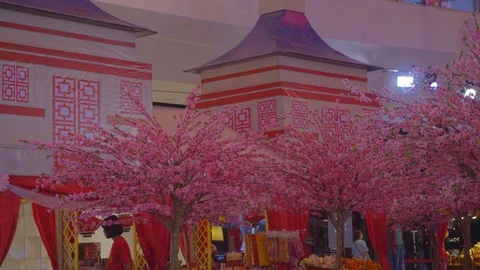 Chinese new year with Cherry trees and model houses Japan style in shopping mall Stock Footage 123747250