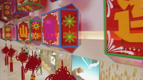 Chinese New Year Decorations with Hanging Ornaments in Bangkok Mall Interior Stock Footage 332744892