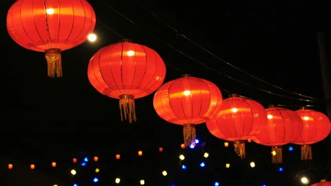 Chinese new year lanterns in the night sky Stock Footage