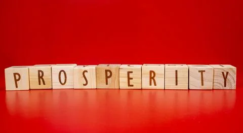 Chinese New Year theme. Prosperity word written on wood block on red backgr.. Stock Photos