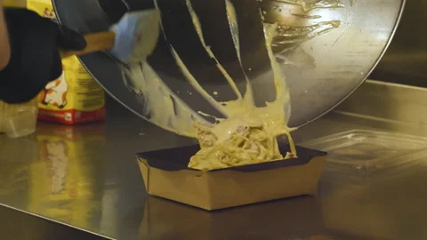 Chinese Noodles Packed In Boxes. Fast Food Video stock 148130099