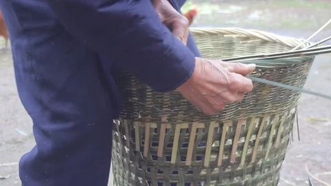 Chinese Old Man Makes Straw Basket Stock Footage 121194576