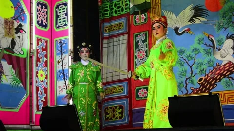 Chinese opera actors performing during religious festivals and celebrations. Video stock 317923534