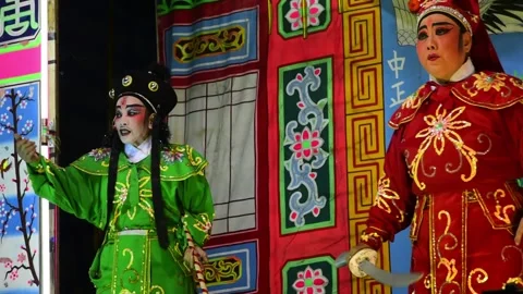 Chinese opera actors performing during religious celebrations and festivals Video stock 317923541