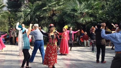Chinese people dancing in the park Stock Footage 128790001
