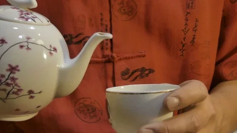 Chinese pours tea in cup Stock Footage 79049401