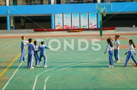 Chinese primary school students in sports, rope skipping Stock Photos
