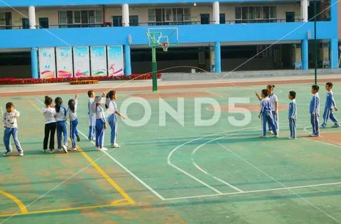 Chinese primary school students in sports, rope skipping Stock Photos