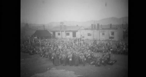 Chinese prisoners assembled ready to move out Stock Footage 43444644