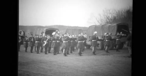 Chinese prisoners listening to army band Stock Footage