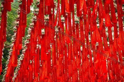 Chinese red bands with prayers in one of the Hangzhou temples Stock Photos