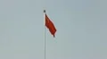 Chinese Red Flags in crowded Tiananmen Square, Beijing, China, Rainy Day HD Footage