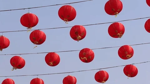 Chinese red lanterns. Hanging from electrical wires. Bangkok, Thailand Stock Footage 82967440