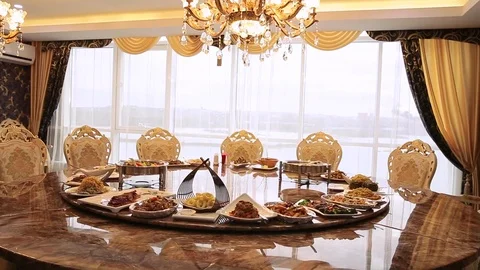 Chinese restaurant in the hotel. Round table with twisting dishes of Chinese cui Stock Footage 81080156