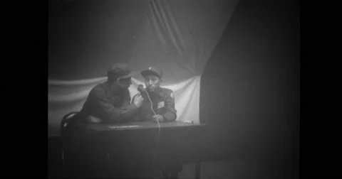 Chinese soldier interviewing a non-repatriate Stock Footage