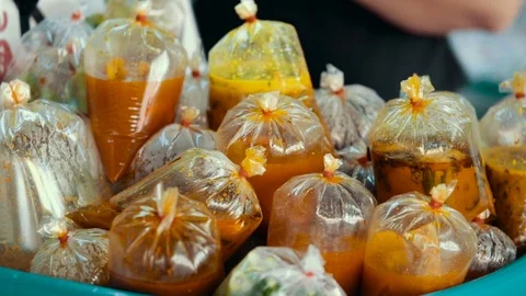 Chinese soups in single-use packages Stock Footage 74409382