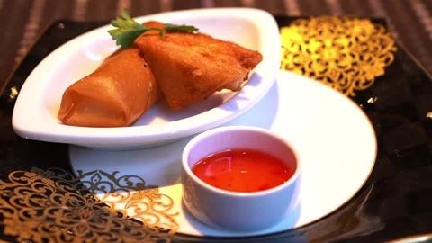 Chinese spring rolls and deep-fried bread with shrimp paste Stock Footage 261418240